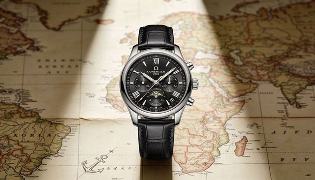 Luxury chronograph wristwatch with moonphase and black leather strap on vintage world map