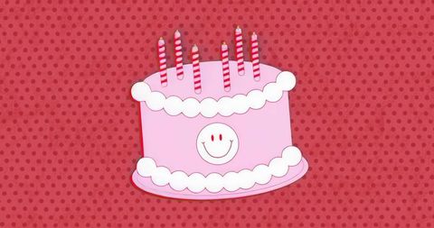 Cheerful pink birthday cake with smiling face and candles