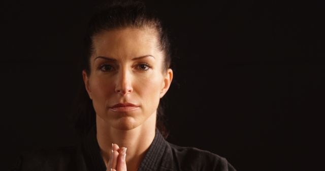 Focused Martial Artist Meditating in Studio - Download Free Stock Images Pikwizard.com