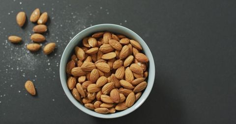 Fresh Almonds in Bowl on Grey Background for Healthy Eating - Download Free Stock Images Pikwizard.com