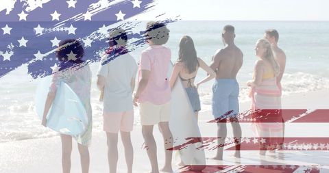 Group of Friends Celebrating American Spirit at Beach