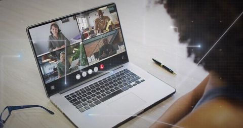Joining remote team meeting on laptop from behind participant for virtual collaboration