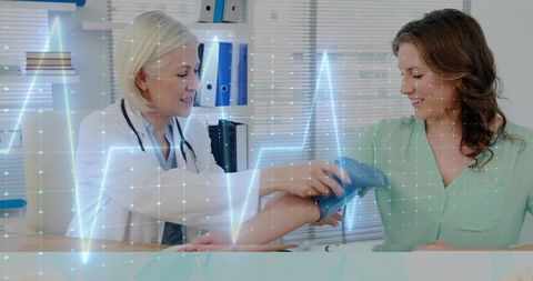 Healthcare Professional Taking Patient's Blood Pressure in Medical Office