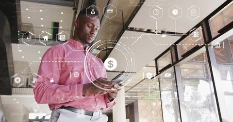 Businessman and Floating Digital Finance Icons in Modern Office Lobby