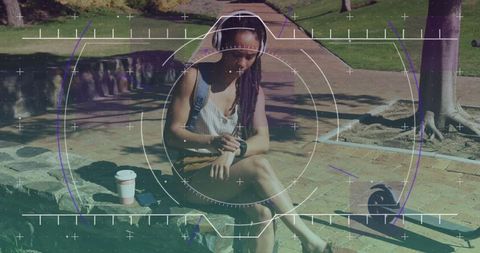 Woman with Braided Hair Sitting on Park Bench Checking Smartwatch Data