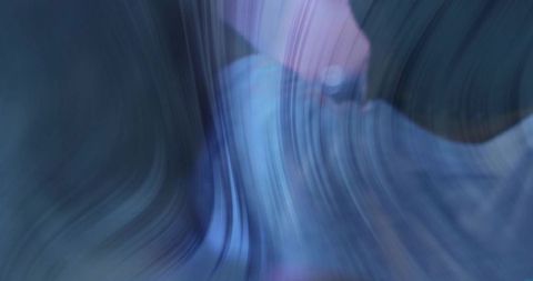 Flowing blue and purple curved streaks with gradient bands for abstract motion background