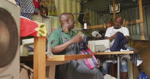 African American Tailors Conversing in Workroom - Download Free Stock Images Pikwizard.com