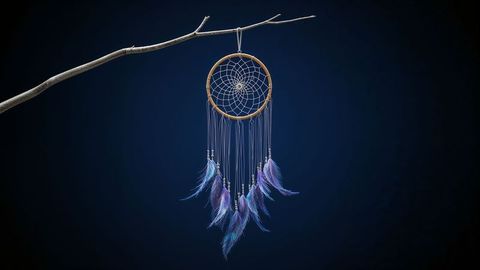 Dreamcatcher Swaying with Purple Feathers Against Dark Gradient Background