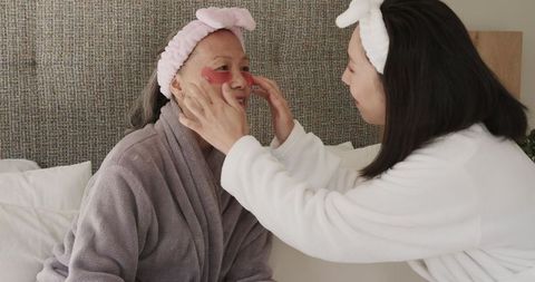 Mother and daughter enjoying relaxing skincare routine together