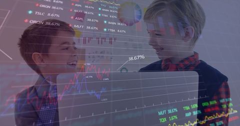 Two Young Boys Analyzing Financial Data on Laptop in Office Environment - Download Free Stock Images Pikwizard.com