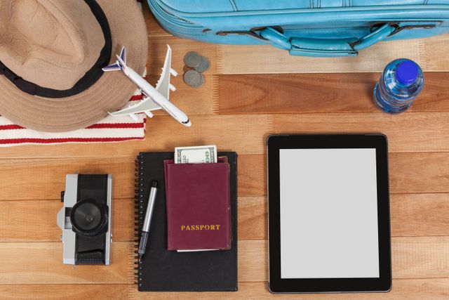 Top-view of holiday and tourism conceptual image with travel accessories