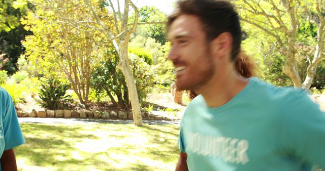 Male Volunteer Enjoying Sunny Day Outdoors in Nature - Download Free Stock Images Pikwizard.com