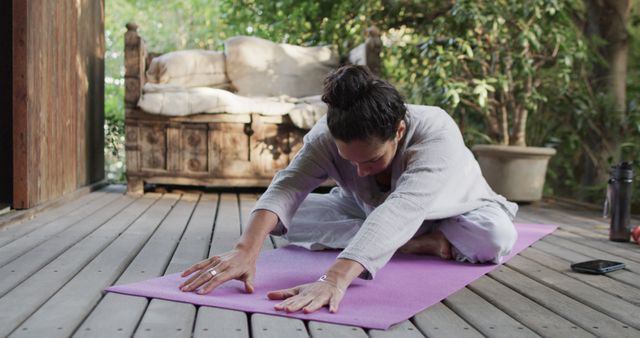 Woman in White Practice Yoga on Pink Mat in Serene Outdoor Space - Download Free Stock Images Pikwizard.com