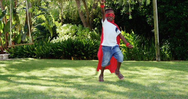 Child Playing Superhero in Red Cape and Mask - Download Free Stock Images Pikwizard.com