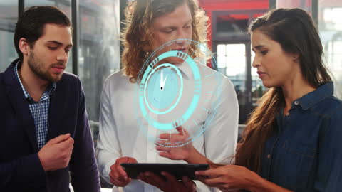 Innovative Business Team Using Tablet with Digital Clock Overlay