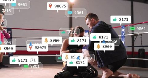 Boxing coach kneeling with female boxer in ring with social media engagement overlays