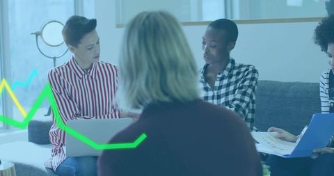 Diverse team collaborates in trendy office for creative solutions