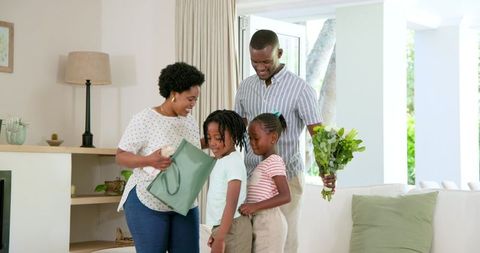 Happy Family Sharing Gifts and Celebrating Together
