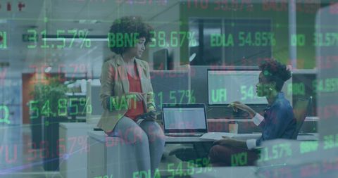 Diverse Professionals Analyzing Complex Stock Market Data in Office