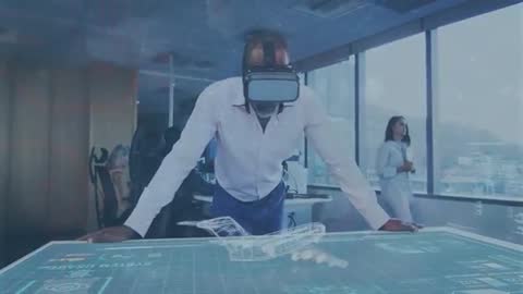 Man Using VR Technology for Interactive Holographic Design in Office