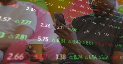 Friends checking stock market data on phone at home