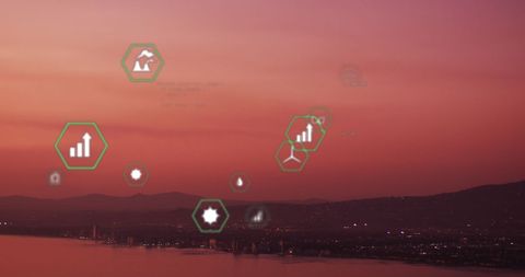 Ecology and sustainability icons over sunset landscape