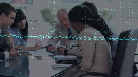 Executive Team Analyzing Data in Modern Office Setting