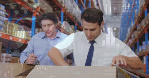 Business Professionals Ensuring Accuracy in Warehouse Operations - Download Free Stock Images Pikwizard.com