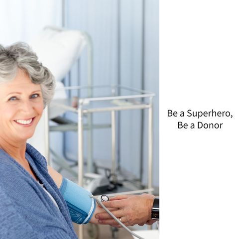Smiling senior woman encouraging blood donation