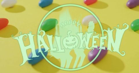 Mint halloween emblem featuring jack-o-lantern silhouettes over colorful jellybeans
