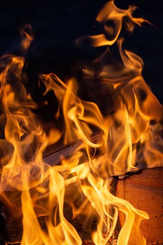 Mesmerizing Flames from Burning Wood, Close-up, Detailed Fire Patterns