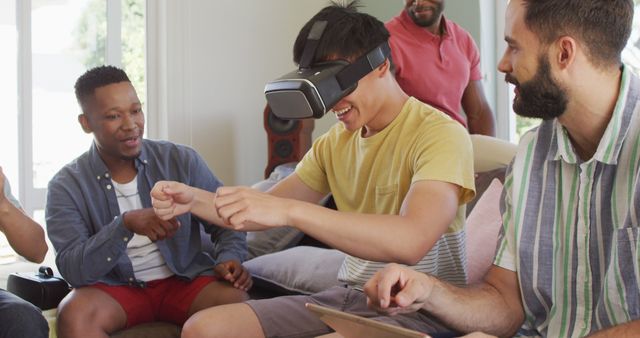 Diverse Group of Friends Laughing and Using Virtual Reality Headset - Download Free Stock Images Pikwizard.com