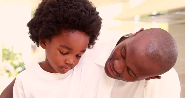 Loving Father Comforting His Young Son at Home - Download Free Stock Images Pikwizard.com