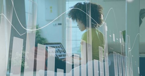 Businesswoman Analyzing Digital Financial Data in Office Setting