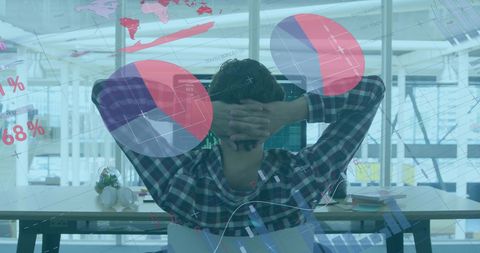 Businessman Analyzing Digital Infographics in Modern Office