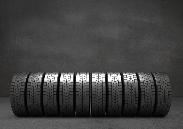 Digital composite image of tyres arranged in a row