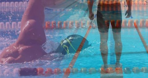 Caucasian Man Powering Through Swimming Pool in Athletic Style