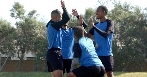 Energetic Soccer Team Celebrating Victory