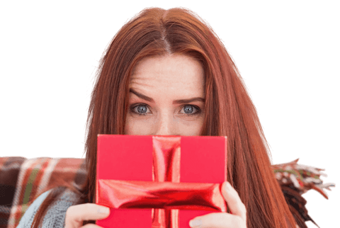 Woman with Red Hair Presenting Gift on Transparent Background