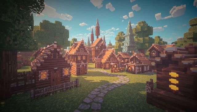 Blocky medieval village with glowing wooden cottages, cobblestone path and tall spires