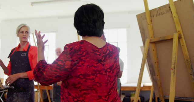 Art Teacher Instructing Students in Bright Studio - Download Free Stock Images Pikwizard.com