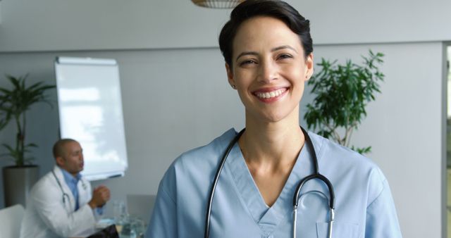 Smiling Female Doctor with Stethoscope in Hospital Office - Download Free Stock Images Pikwizard.com