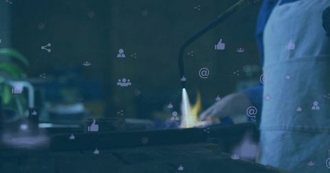 Chef torching skillet flame in kitchen with digital social media overlay closeup and ambience