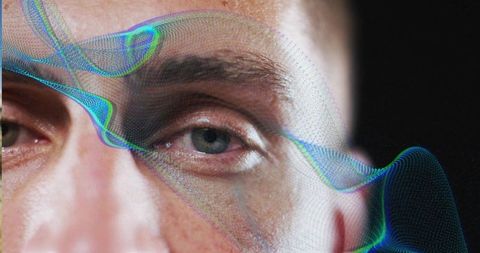 Mid adult male with neon digital mesh wave on face