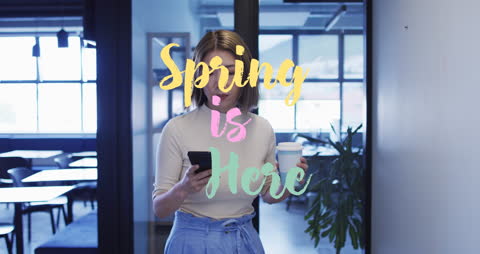Woman in Office Holding Coffee and Smartphone with Spring Message Overlay