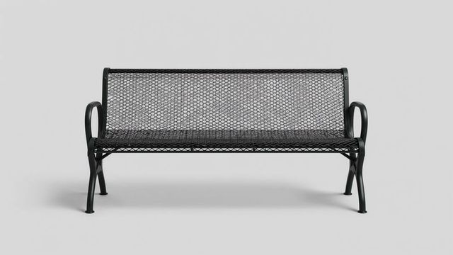 Contemporary black metal mesh bench on light gray background
