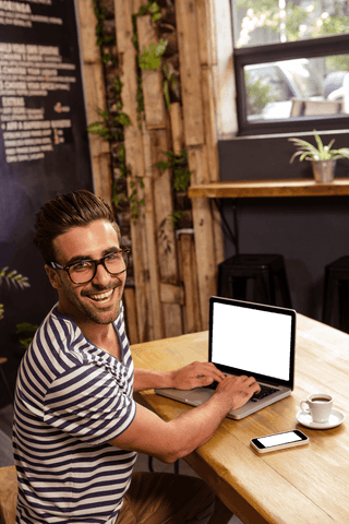 Bearded Man with Glasses in Cafe Using Laptop - Download Free Stock Videos Pikwizard.com