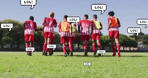 Youth soccer team enjoying training with playful vibes