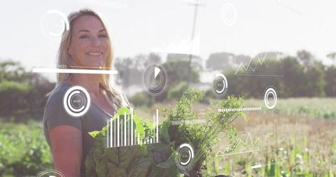 Female Farmer Overseeing Farm Data and Produce in Field