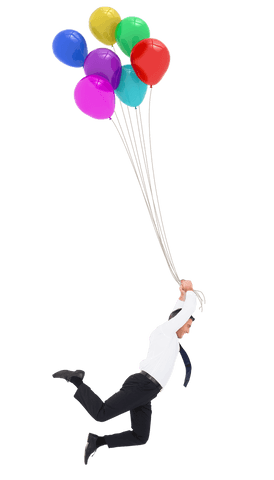 Energetic businessman enthusiastically creating with colorful balloons
